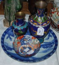 A group of Japanese items to include two cloisonne vases, an Imari pattern frill-rimmed footed bowl,