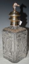 A modern silver mounted cut glass decanter and stopper with Edinburgh hallmarks, the stopper with