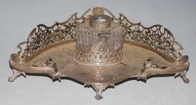 A London silver desk stand with detachable cut glass inkwell (lacking cover), 25cm wide, weight of