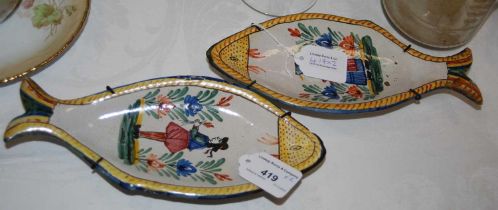 Two Henri Quimper fish-shaped dishes.