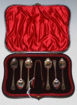 A cased set of six Sheffield silver teaspons and tongs.