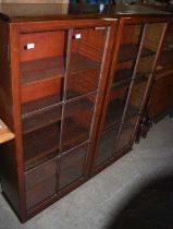 A 20th century mahogany astragal glazed twin door cabinet top.