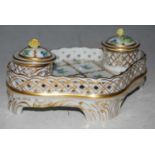 A Herend porcelain desk stand set with two integral inkwells, each with detachable cover and