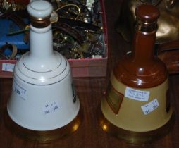 A 1983 Bells bell-shaped whisky decanter, to commemorate the Queen's Award for Export Achievement