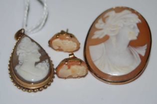 A 9ct gold mounted pear-shaped cameo pendant, together with a pair of 9ct gold mounted oval cameo