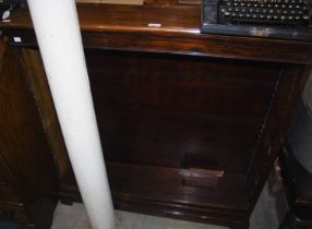 A 20th century mahogany open bookcase with three adjustable shelves raised on four bracket feet.