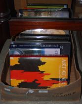A box containing various auction yearbooks and art reference books, to include examples by
