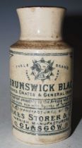 A 19th century pottery bottle for 'Brunswick, Black for Stoves, Grates and General Ironwork',