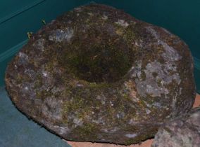 A stone bird bath.