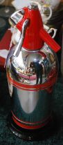 A Sparklets Limited chrome plated soda syphon with red accents