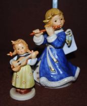 Two Goebel figures, 'Weihnacht' and 'RE98'.