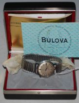 A vintage Bulova Accutron Swiss made wristwatch with silvered dial, baton numerals, date aperture,