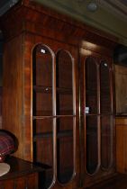 A 19th century mahogany two-part secretaire bookcase, the upper section with moulded cornice above
