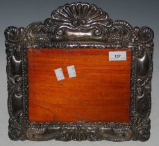 A stirling silver mounted rectangular photograph frame / dressing table mirror (lacking mirror