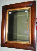 A late 19th century rosewood framed rectangular bevelled wall mirror, 52cm x 42cm, together with a