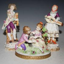 A pair of late 19th/ early 20th century Continental porcelain figures, male bagpipe player and