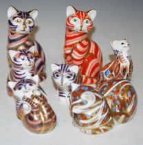 A collection of seven assorted Royal Crown Derby cat figures, the tallest 13cm high.