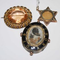 Three assorted brooches to include a 19th century yellow metal and black enamel mourning brooch