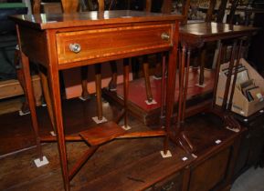 An Edwardian mahogany and inlaid rectangular side table with single frieze drawer with brass