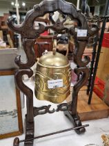 A Chinese gilt metal gong mounted in a hardwood stand with matching beater.