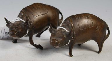 Two Chinese bronze models of ox, approx. 6.5cm high and 6cm high.