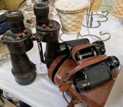 A leather cased set of Ellgee Cadet 8 x 25 binoculars, together with another cased set of binoculars