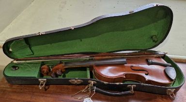 An antique violin in a fitted black case, with inscribed paper label 'Nicolaus Amatus Cremonen