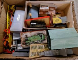 A box of vintage toys to include two 00 gauge locomotives and track accessories, a collection of