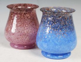 Two Monart vases, shaped RA, one mottled purple and pink with gold coloured inclusions bearing