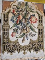 A late 19th century beadwork panel depicting a bouquet of flowers within an architectural formed