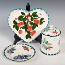 A Griselda Hill Pottery for Wemyss heart shaped tray decorated with cherries, together with a Poma