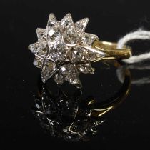 An 18ct yellow gold, silver and diamond set star style cluster ring (probably marriage of a modern