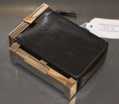 Tom Ford for Yves Saint Laurent, a combination black leather and chrome plated cigarette box with