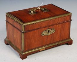A 19th century kingwood and brass bound tea caddy, the top with brass carry handle opening to an