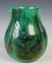 An early Monart glass vase, shaped SA, with stoneware type decoration, mottled green and blue with