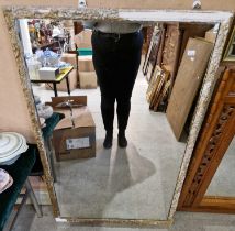 A white and gilt framed rectangular wall mirror, 123.5cm x 79cm.