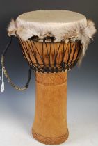 Tribal Art - A modern Djembe African drum of recent manufacture, approx. 29cm diameter x 81cm high.