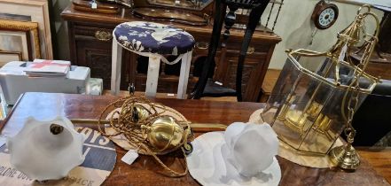 A 20th century brass rise and fall type light with two opaque glass shades, together with a brass