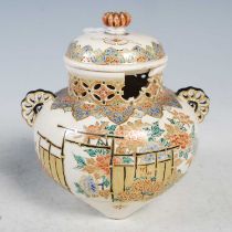 A Japanese Satsuma pottery koro and cover, Meiji Period, decorated with fenced garden of peony, on