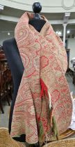 A late 19th/ early 20th century double sided paisley pattern shawl, approx. 178cm x 163cm.