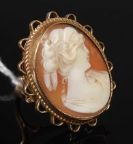 A 9ct gold and cameo set dress ring, size L, gross weight 10 grams.
