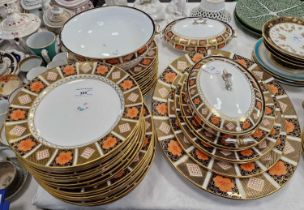 A Royal Crown Derby ‘Old Imari’ pattern part dinner set comprising plates, oval serving dishes,