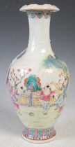 A Chinese porcelain famille rose vase, early 20th century, decorated with nine boys playing in a