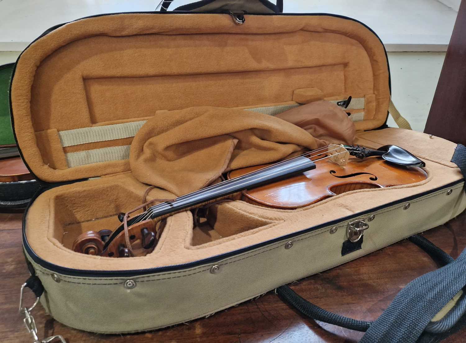 An antique violin, probably maple wood, with an 'Aubert A Mirecourt of France' bridge, bearing paper