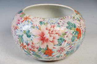 A Chinese porcelain 'millefleurs' bowl, late 19th/ early 20th century, bearing Qianlong seal mark (