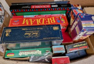 A box of assorted vintage and later board games, to include Scrabble, Jenga, Trivial Pursuit,