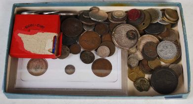 A box of assorted vintage coinage.