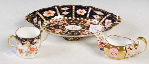 A Royal Crown Derby Imari pattern oval-shaped dish, together with a Royal Crown Derby two-handled