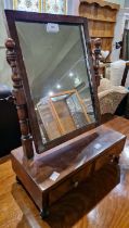 A 19th century mahogany and ebony lined dressing table mirror, the base fitted with two small