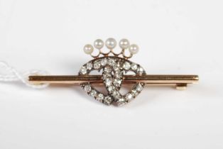 A late 19th century yellow and white metal diamond and pearl set Luckenbooth bar brooch, set with